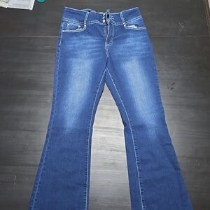Size 11/12 3 button high waisted jeans.